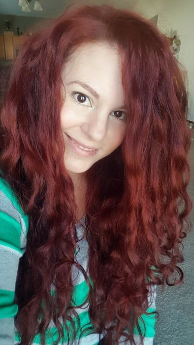 The reviewer after using the curl-defining cream