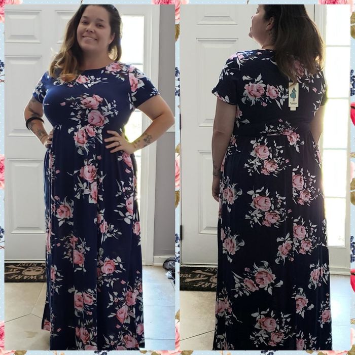A reviewer in the dress in blue