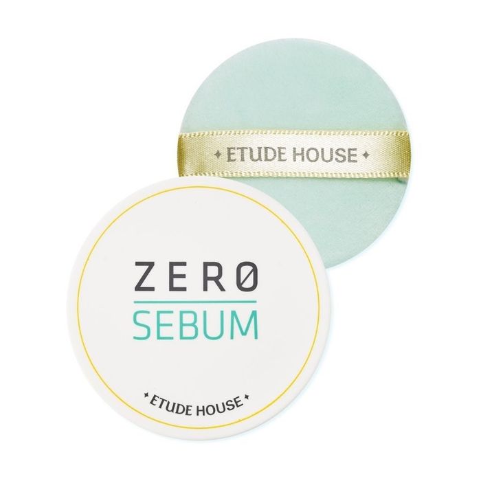 The jar of translucent powder with an included application puff
