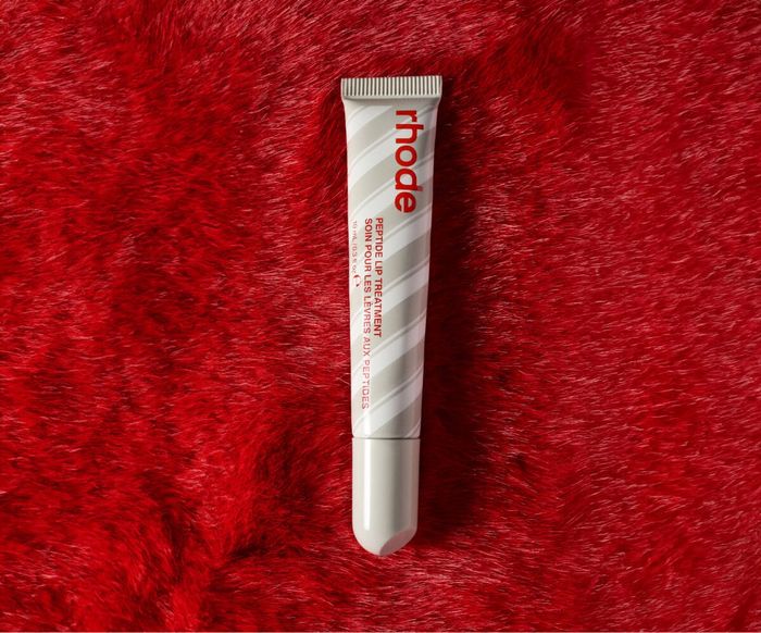 Lip treatment tube labeled