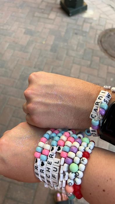 A reviewer showing their hands covered in glitter