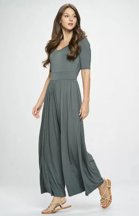 An olive-colored knit jumpsuit, perfect for effortless styling.