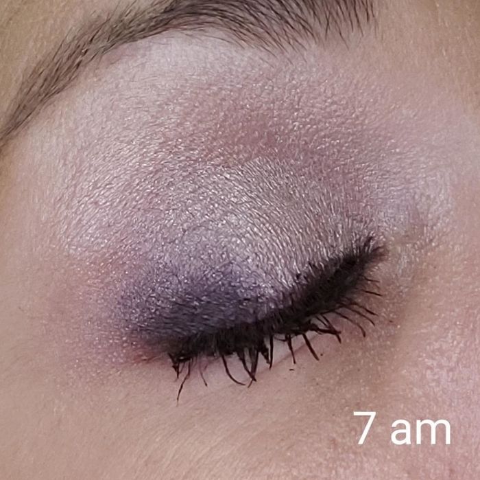 A reviewer's closed eye with eyeshadow applied, labeled.