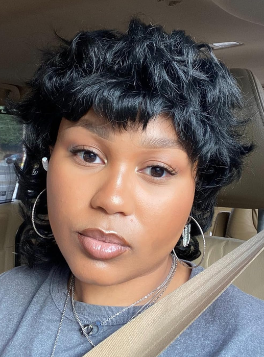 A reviewer showing off their radiant, glowing makeup look.