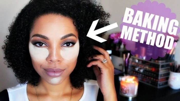 Karina Waldron's face with a generous application of setting powder under her eyes for baking