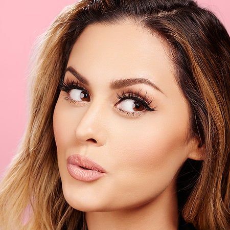 Model sporting a fully completed makeup look