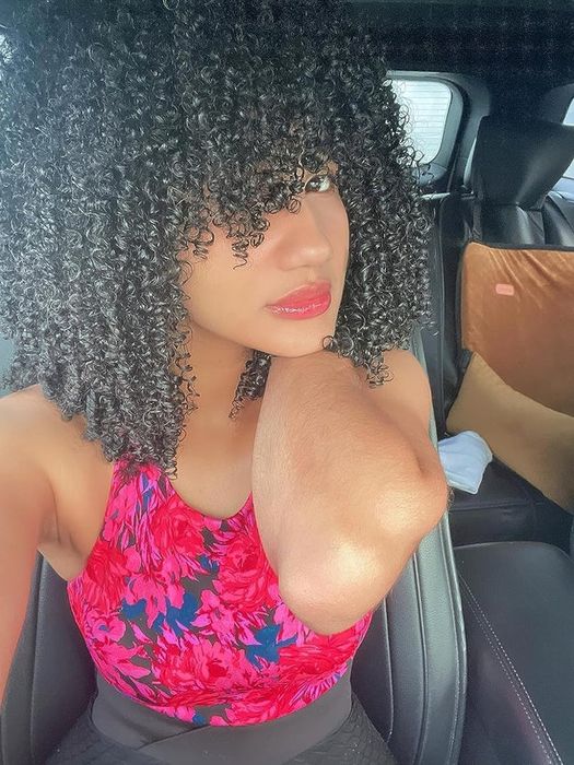 Reviewer showcasing soft, well-defined curls
