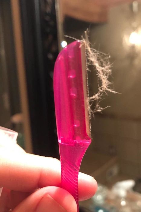 a reviewer's photo showing the razor with peach fuzz removed
