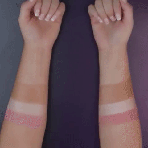 A gif showing two arms with makeup swatches, one with setting spray and one without. The makeup on the arm with the setting spray stays intact far better than the arm without it.