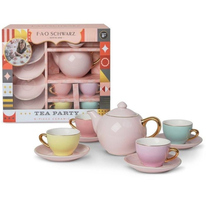 A close-up view of the delicate and colorful ceramic tea party set.