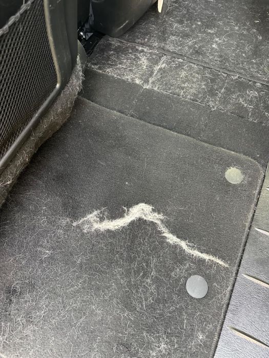 A portion of the car floor cleared with the help of a tool