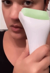 gif of a reviewer using the Esarora ice roller on their face