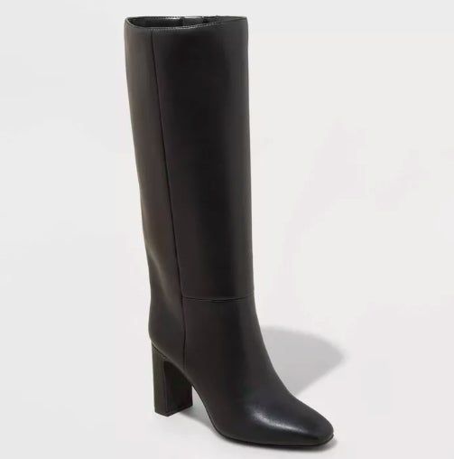 Black knee-high heeled boots with a smooth, modern design