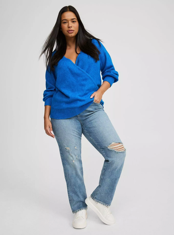 Model in a wrap sweater