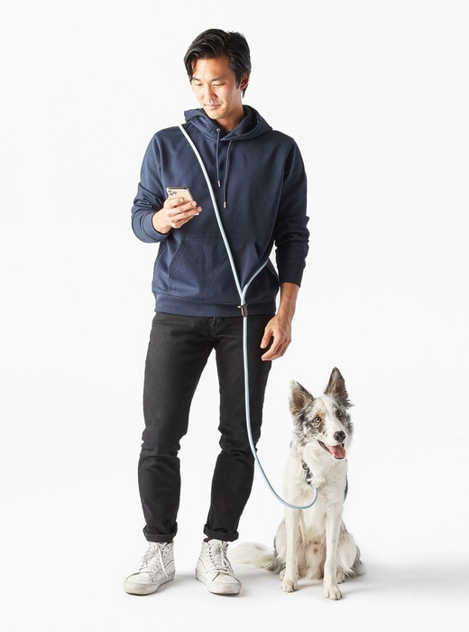 model wearing the magic link leash across their body
