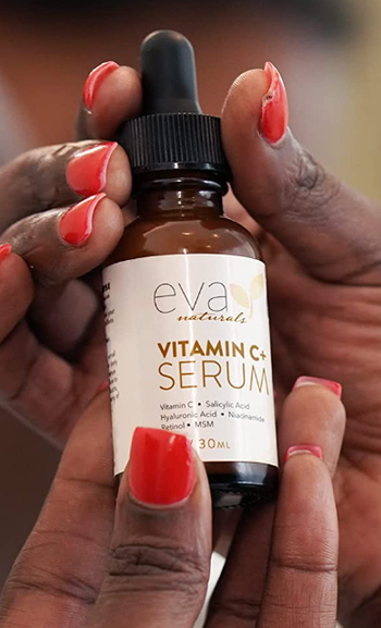 a model showcasing the vitamin C serum