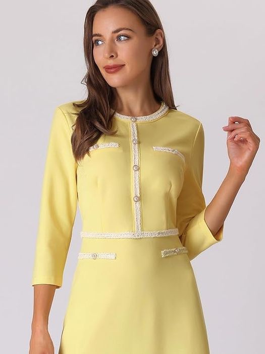 Another model in the same dress, but in yellow