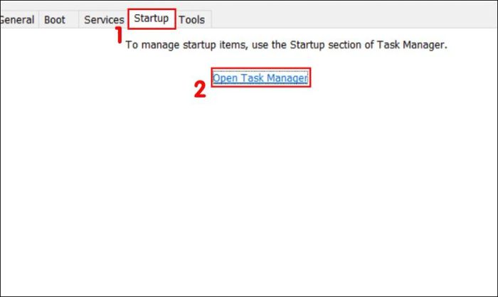 Chọn tab Startup, sau đó nhấn vào Open Task Manager