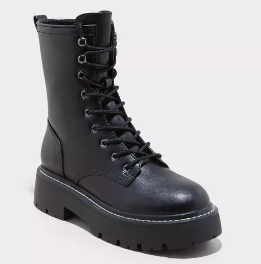 Black combat boots featuring a chunky sole and a lace-up design for a bold and edgy look