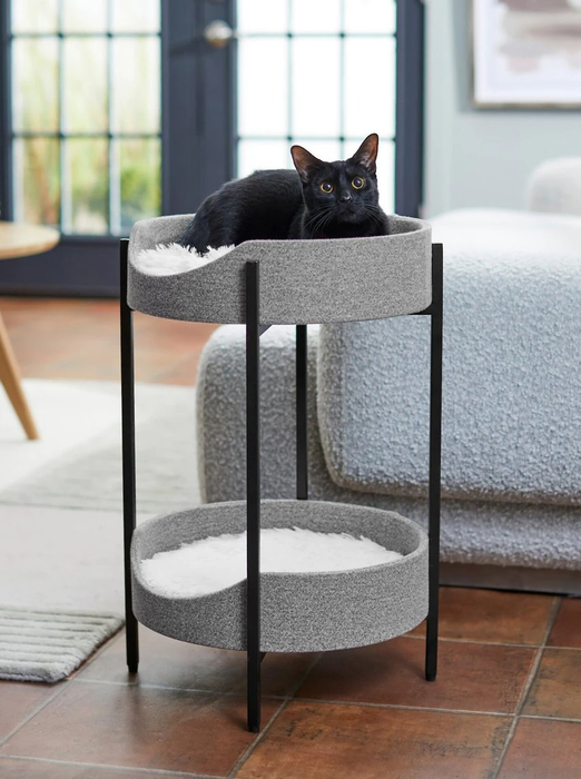 The gray, two-tiered cat tower