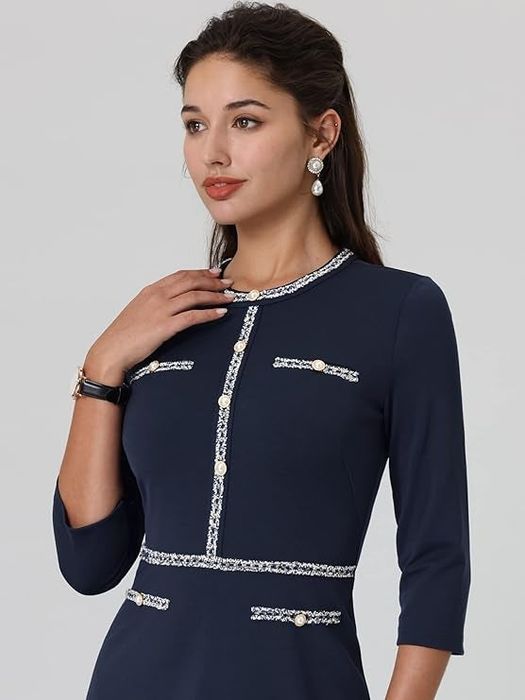 Model in a navy blue dress