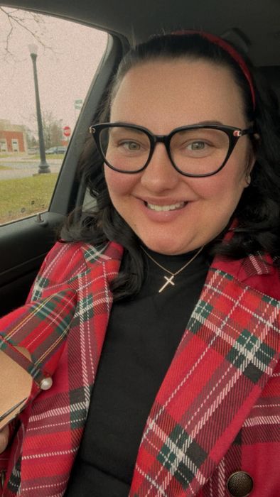 Person sporting the top underneath a blazer.