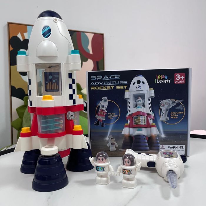 Space Adventure Rocket Set, complete with a rocket, two astronaut figures, and a drill accessory for added fun