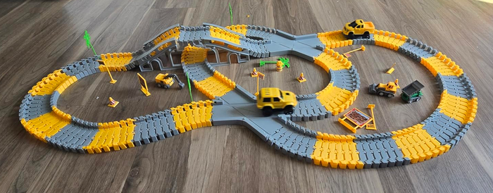 A photo from a reviewer showing the track laid out on a floor