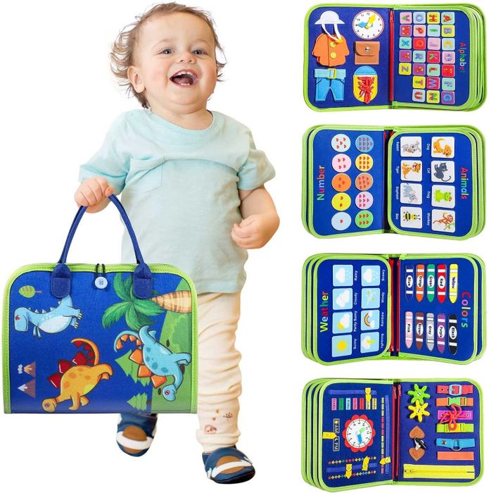 A toddler holding a felt busy book filled with educational activities such as numbers, animals, weather, and colors