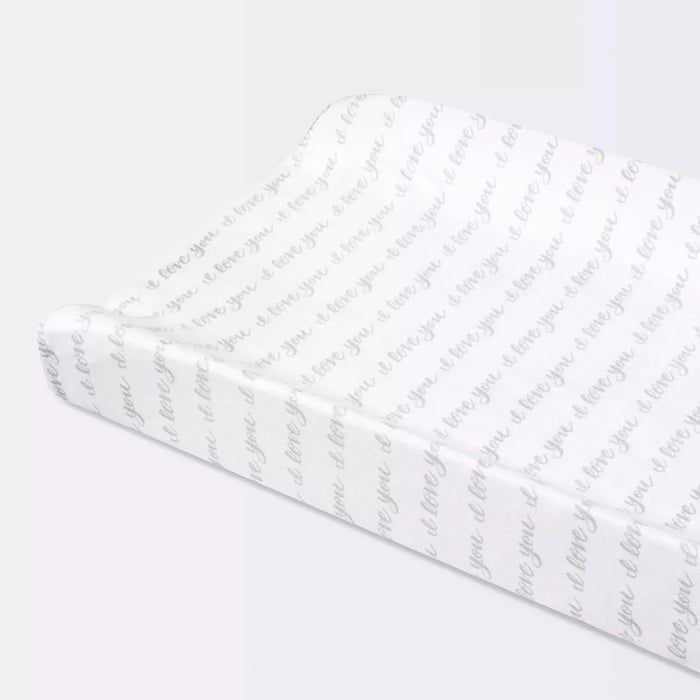 A soft, plush changing pad cover.