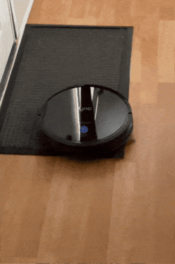 A reviewer’s gif showing their robot vacuum in action.