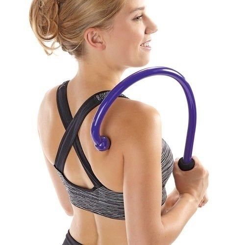 A person demonstrating the large hook-shaped massager on their mid-back and shoulders