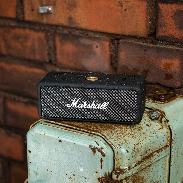 A rectangular speaker with the Marshall logo emblazoned on it
