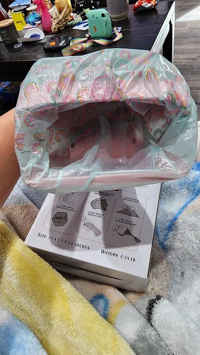 A poop bag wrapped around the scooper