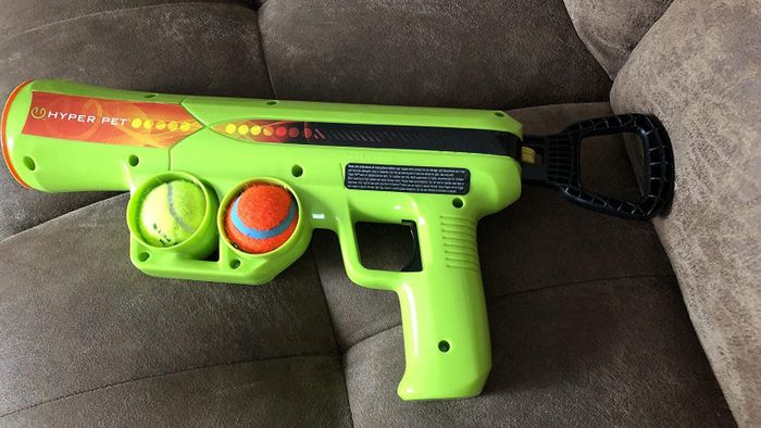 The reviewer's ball launcher with two balls loaded into the mechanism