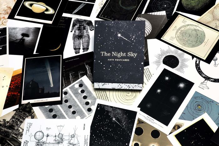a stack of cards adorned with moon-themed designs