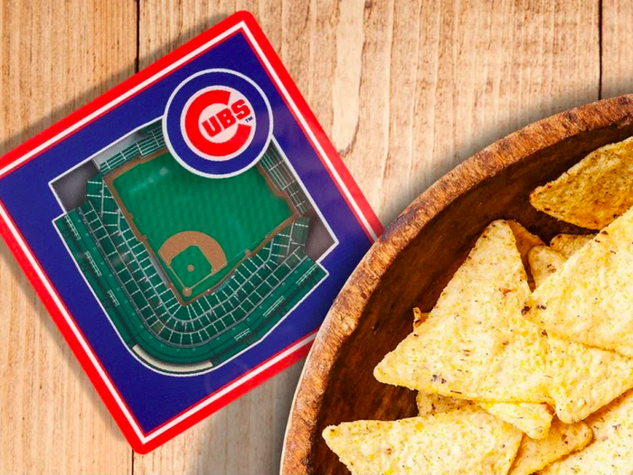 a transparent coaster containing a tiny 3D stadium