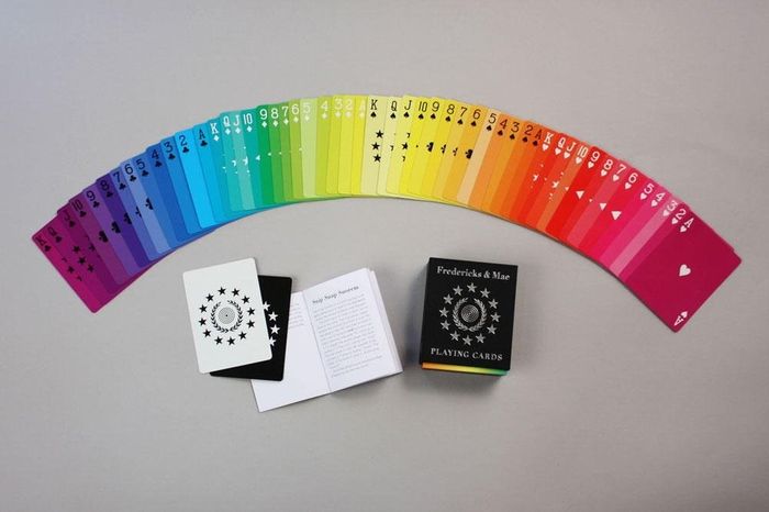 solid-colored cards arranged in a rainbow sequence to form a gradient effect