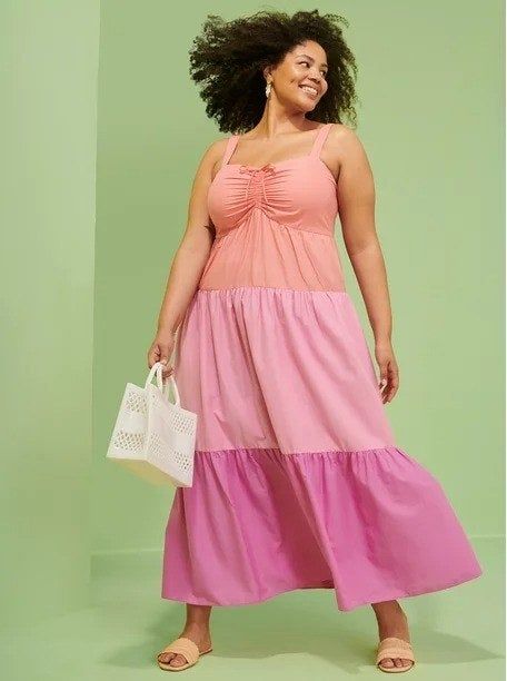 Model wearing the colorblocked pink dress.