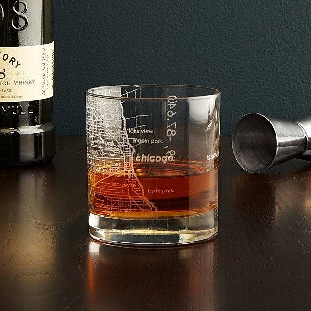 A glass etched with a map of Chicago's city layout