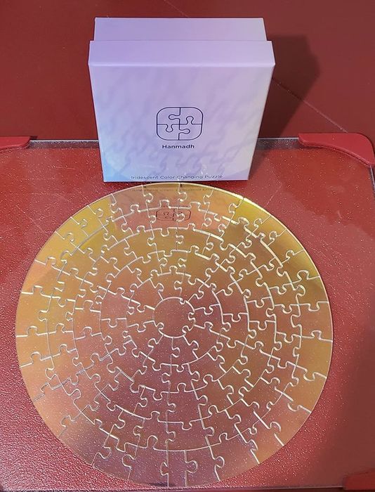 A fully assembled transparent circular puzzle