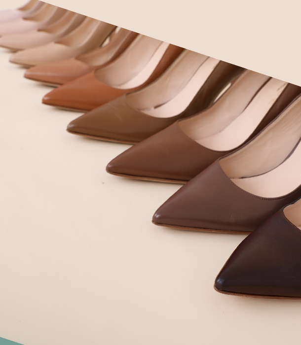 A lineup of nine different nude-colored heels displayed side by side