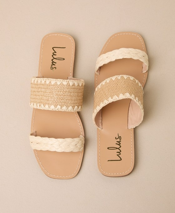 Two beige sandals placed side by side, both featuring woven crisscross straps and the word 