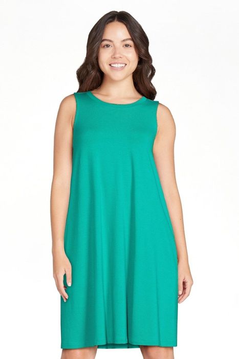 The model is wearing the emerald bliss dress.
