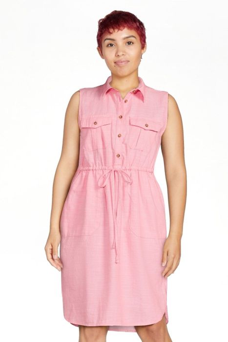 The model is wearing the coral rose dress.