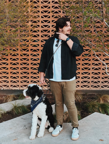 Another model wearing the leash across their body