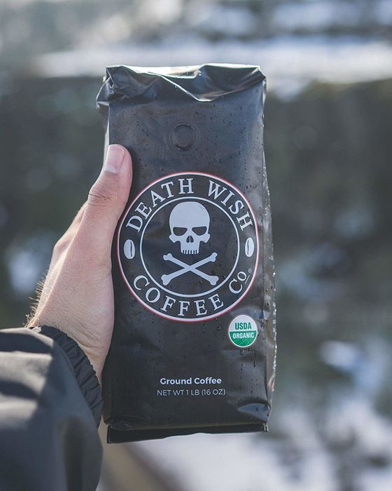 A bag of coffee with a skull and crossbones design labeled 'Death Wish Coffee'