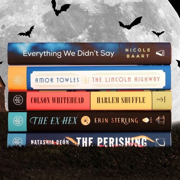 A collection of October's Book of the Month selections stacked together.