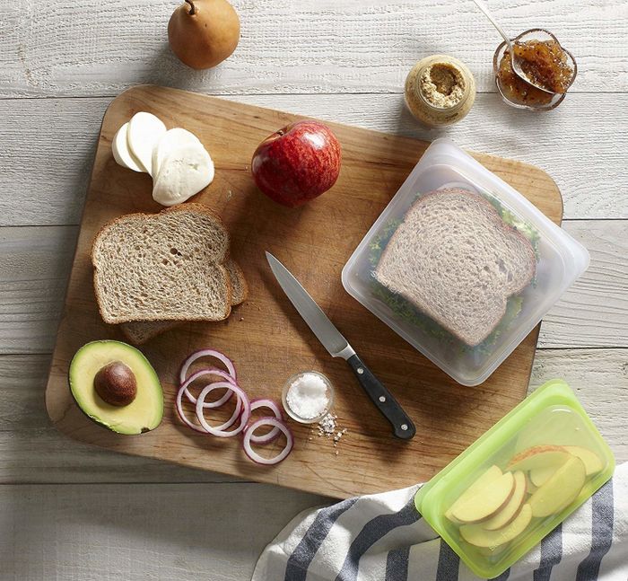 Sliced apples neatly packed in the snack-size bag, with a sandwich fitting perfectly into the sandwich-sized bag