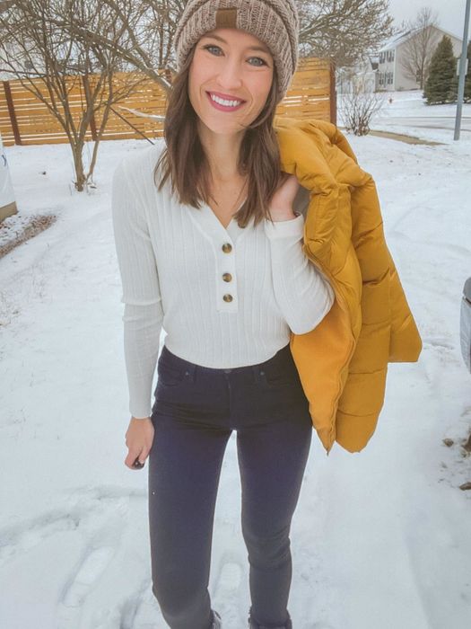 Reviewer styled in the white version of the top with three buttons down the center